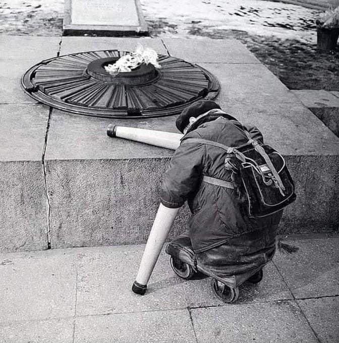 Photo of a Soviet war veteran near the Eternal Flame on the anniversary of Victory Day, 1966.
