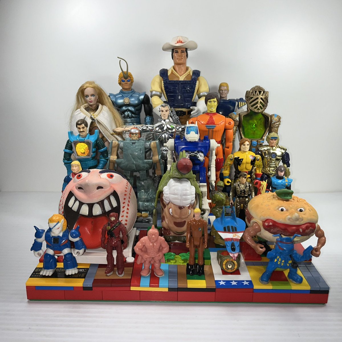 DrGimic's tweet photo. THE PLASTIC PANTHEON
25 Heroic Leaders from 25 toy lines from across the multiverse!!  How many do you remember?? MILS Plate display built by my amazing wife @Forever9702!!

Season 1:  
Started 9/29/2022
Finished 4/5/2024

#PlasticPantheon https://t.co/ECSNChhVus