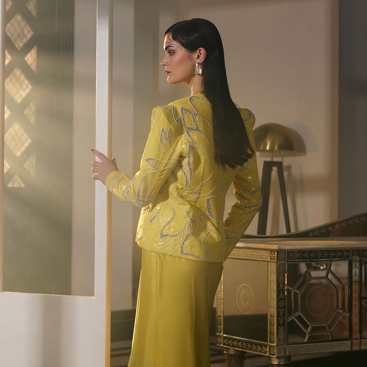 Sunny Couture🌟Command the fashion scene with #TheJacketStory in this vibrant yellow ensemble,  showcasing a sleek satin skirt, opulent sequin jacket Accentuate with bold accessories for a stunning look✨Explore our latest collections and find your perfect style  #TheJacketStory