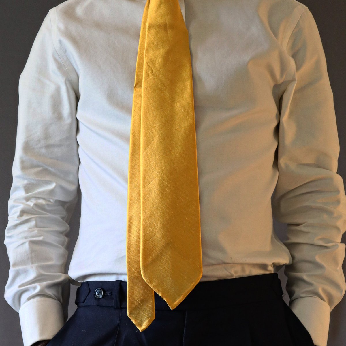 CEO’S LEGACY ACCESSORIES.       The golden wrap! Our handmade ties are very unique pieces. This golden necktie is handmade in England with finest silk and wool interlining. Create your perfect knot  #🪢 #ceoslegacy #accessories #tie #necktie #mensaccessories #accessorize #silk