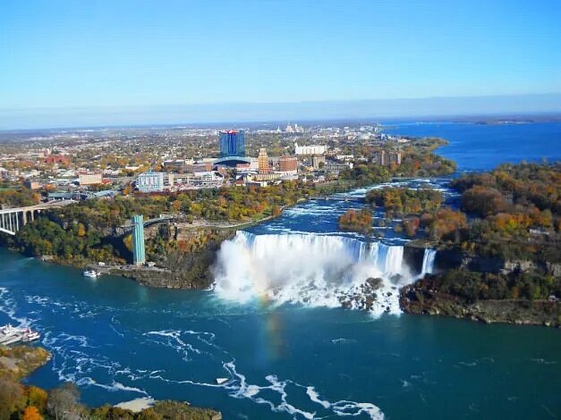 SchwartzPropert's tweet photo. Niagara Falls, New York & Ontario

Niagara Falls

One guaranteed way to feel the awesome power of nature is to visit the inimitable Niagara Falls. There are three magnificent falls here, two American and one Canadian. On this tour of the American side of the falls you’ll get aerial views from the observation deck at Skylon Tower, get up close to Horseshoe Falls on the Maid of the Mist boat ride, and also reach the closest accessible point of the falls at Cave of the Winds.