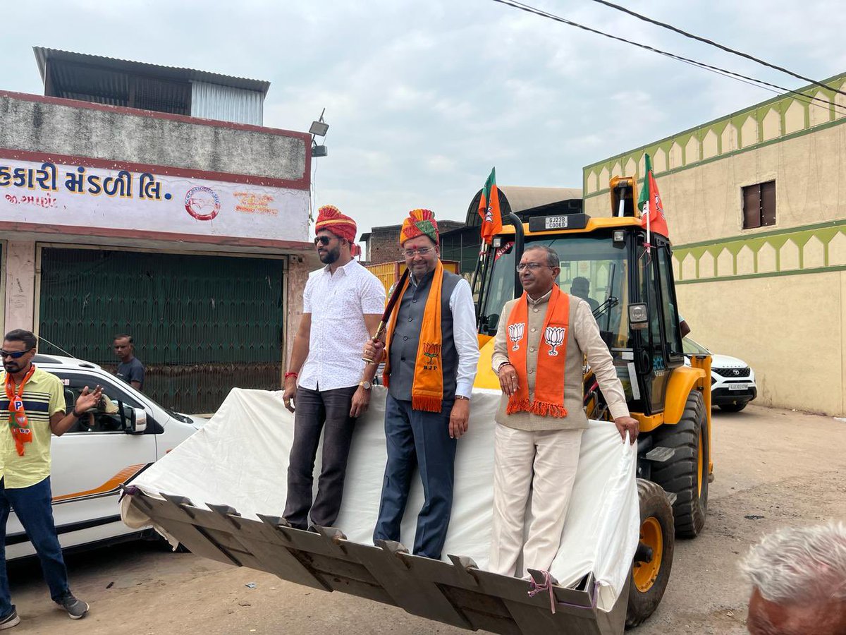 BJP candidate from Anand Mitesh Patel campaigns on a JCB in Borsad