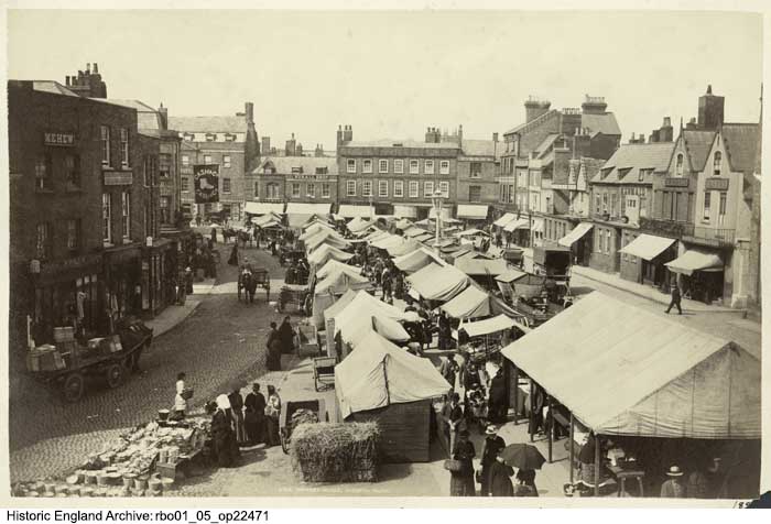 Today's image from the Historic England Archive is a lovely elevated view of the Market Place in Wisbech, Cambridgeshire. It was taken in around 1897. You can discover more images of Wisbech👇 historicengland.org.uk/images-books/p… #Wisbech