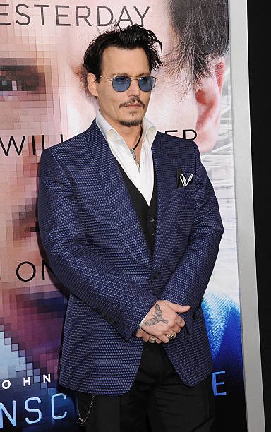 Johnny Depp attended Transcendence film premiere in Los Angeles, California on April 10, 2014 (📸Frederic J. BROWN).