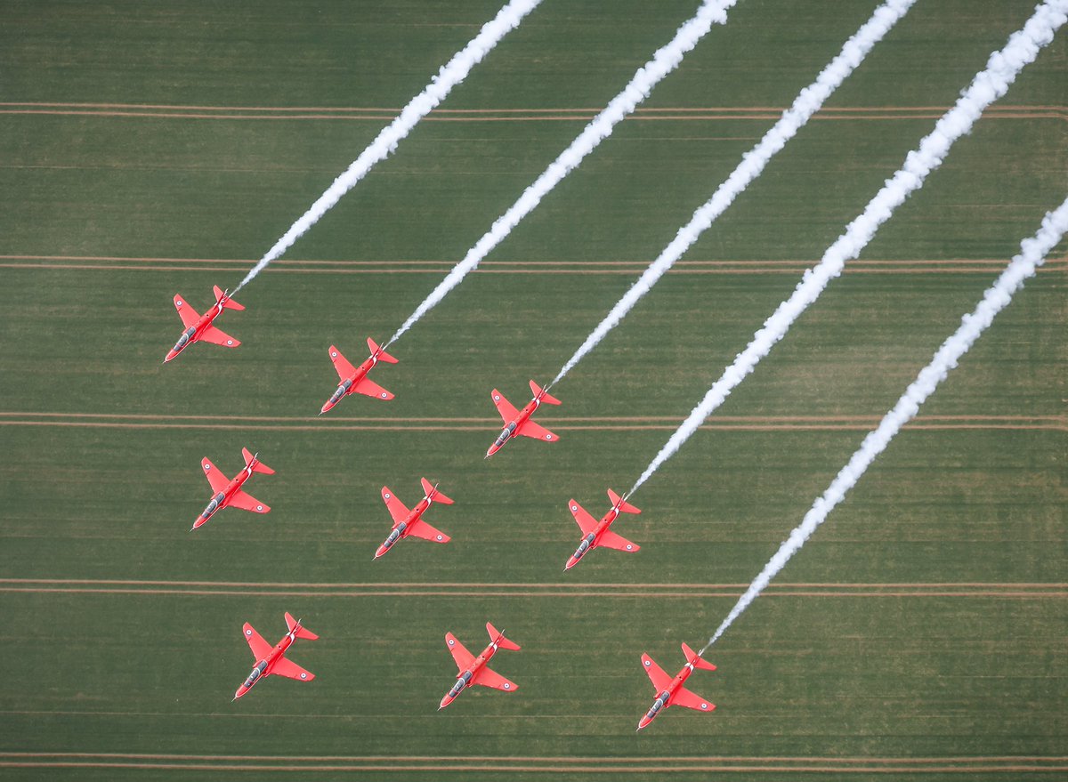 Great images above @RAFWaddington and #Lincoln from the #RedArrows’ last nine-ship training sortie in the UK, before heading overseas to complete preparations for the 60th diamond season. Pictures by Corporal Phil Dye flying with Wing Commander Adam Collins.