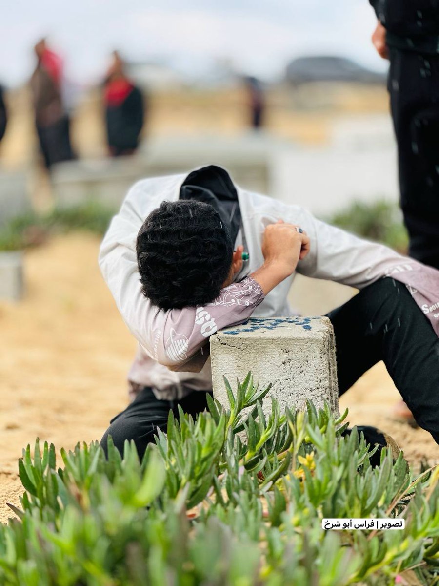 Palestinians spent their Eid Morning in Gaza next to their Martyrs graves 💔 ..