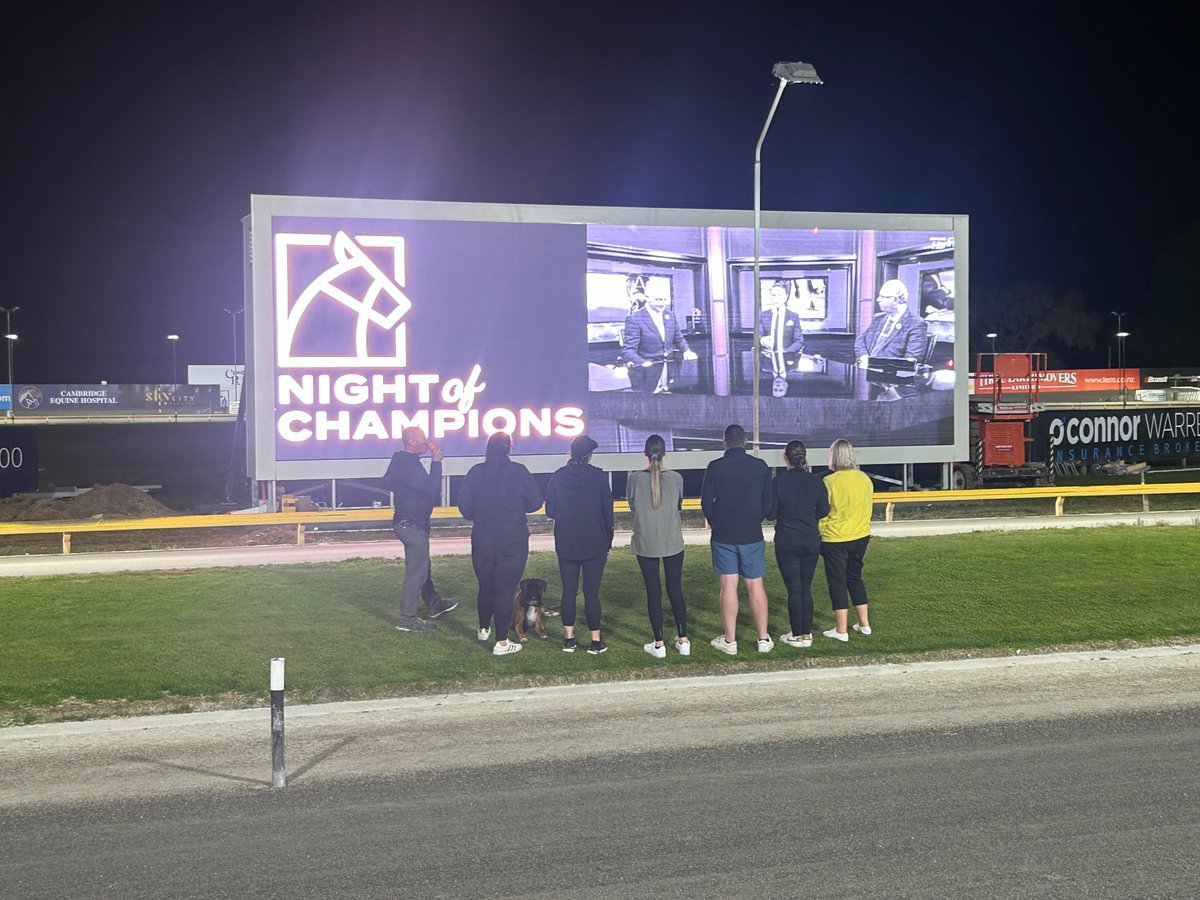 The Cambridge Raceway team taking 5 minutes away from set up to check out the @boxseatnz   #NightOfChampions preview show on the new big screen 📺