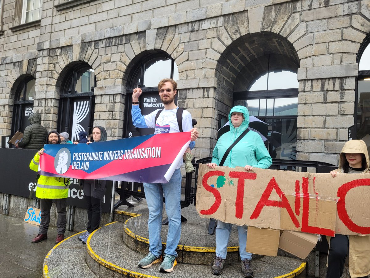 TCDSU_President's tweet photo. .@PWO_TCD @PWO_Ireland have blockaded the Book of Kells @tcddublin for workers' rights and living stipends. @tcdsu also highlights that TCD keeps postgraduate researchers systematically underpaid and exploited while at the same time trying to increase masters fees. #ripofftcd https://t.co/MKA1G26Dc1