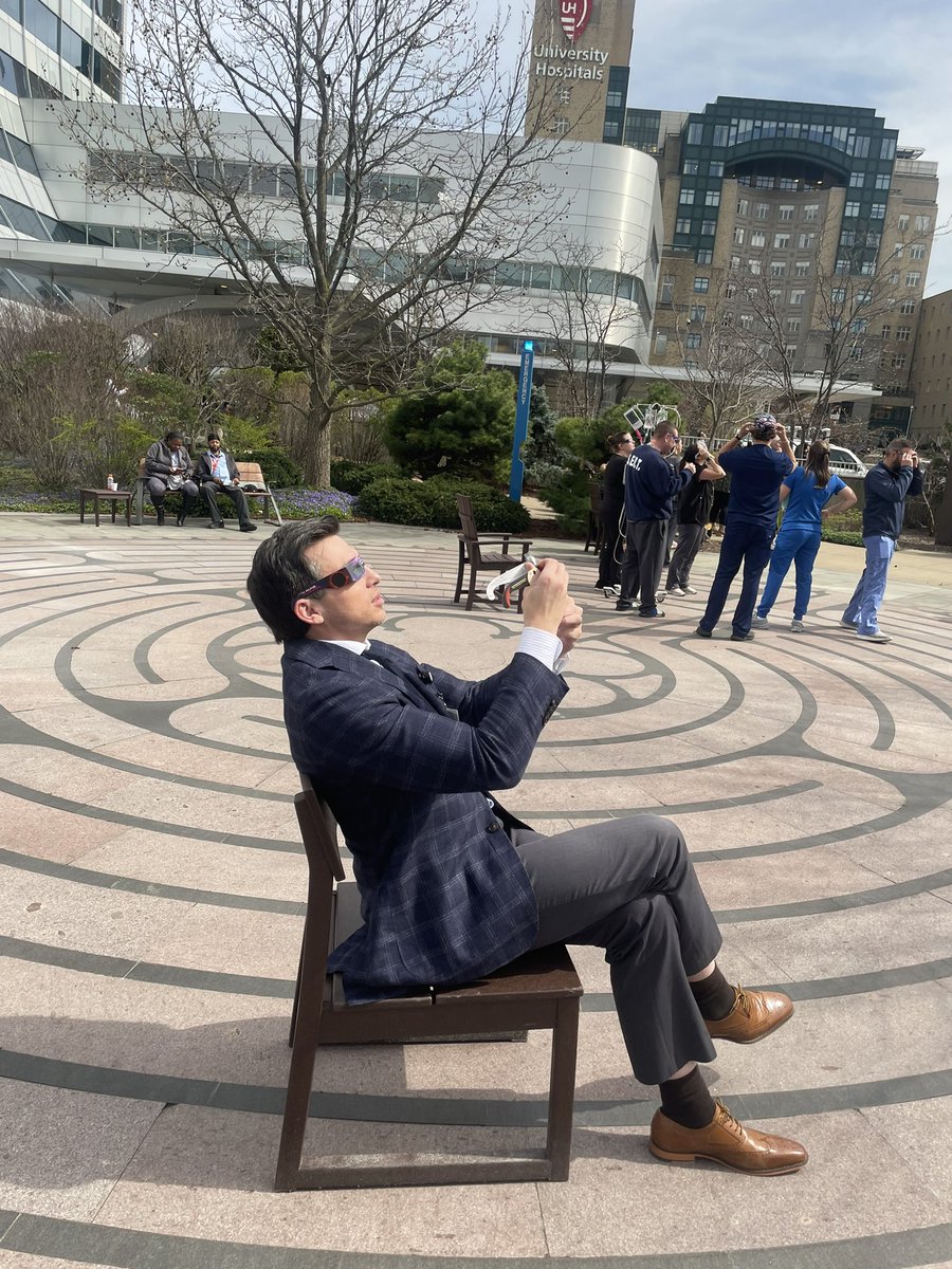 @DrSpratticus @angela_jia_ @RadOncUH @cwspeers @APrice_BeamOn Also outside @RadOncUH during the eclipse…. @DrSpratticus demonstrating proper eye safety and a new interpretation to “chairperson” ⚡️