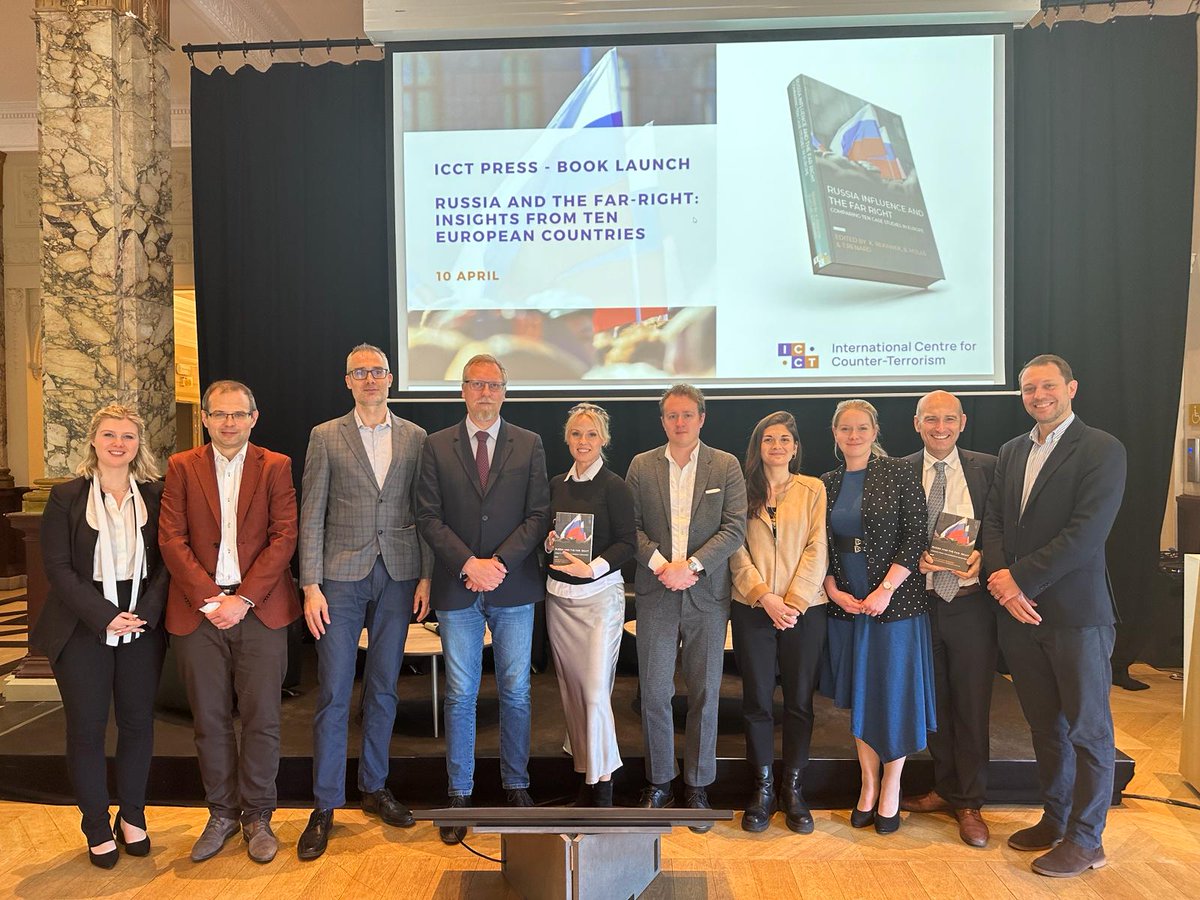 so it is a wrap- @tom_renard @N_Henin @VeruVichova @Morgan_Finnsio @A_SHEKH0VTS0V @DanielMiloSK @CraanenAnne @ZgutEdit , Ottavia Galuzzi and yrs truly pose for a family photo during today's @ICCT_TheHague book launch of #Russia and the #farright. Was a blast, thank you all!