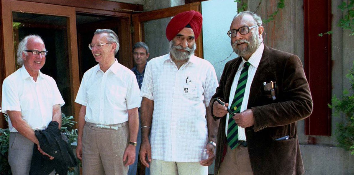 ICTP joins the physics community in mourning the passing of Physics Nobel Laureate Peter Higgs. He visited ICTP in 1987, where he was photographed with fellow physicists Herwig Schopper, Hardev Singh Virk and Abdus Salam.