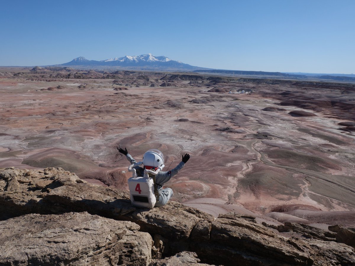 A member of Crew 296 enjoying looking out over the beautiful expanse that is southern #Utah, with our #MDRS campus in the distance. #marsanalog #stem #analogastronauts @UCLouvain_be 🇧🇪 #science