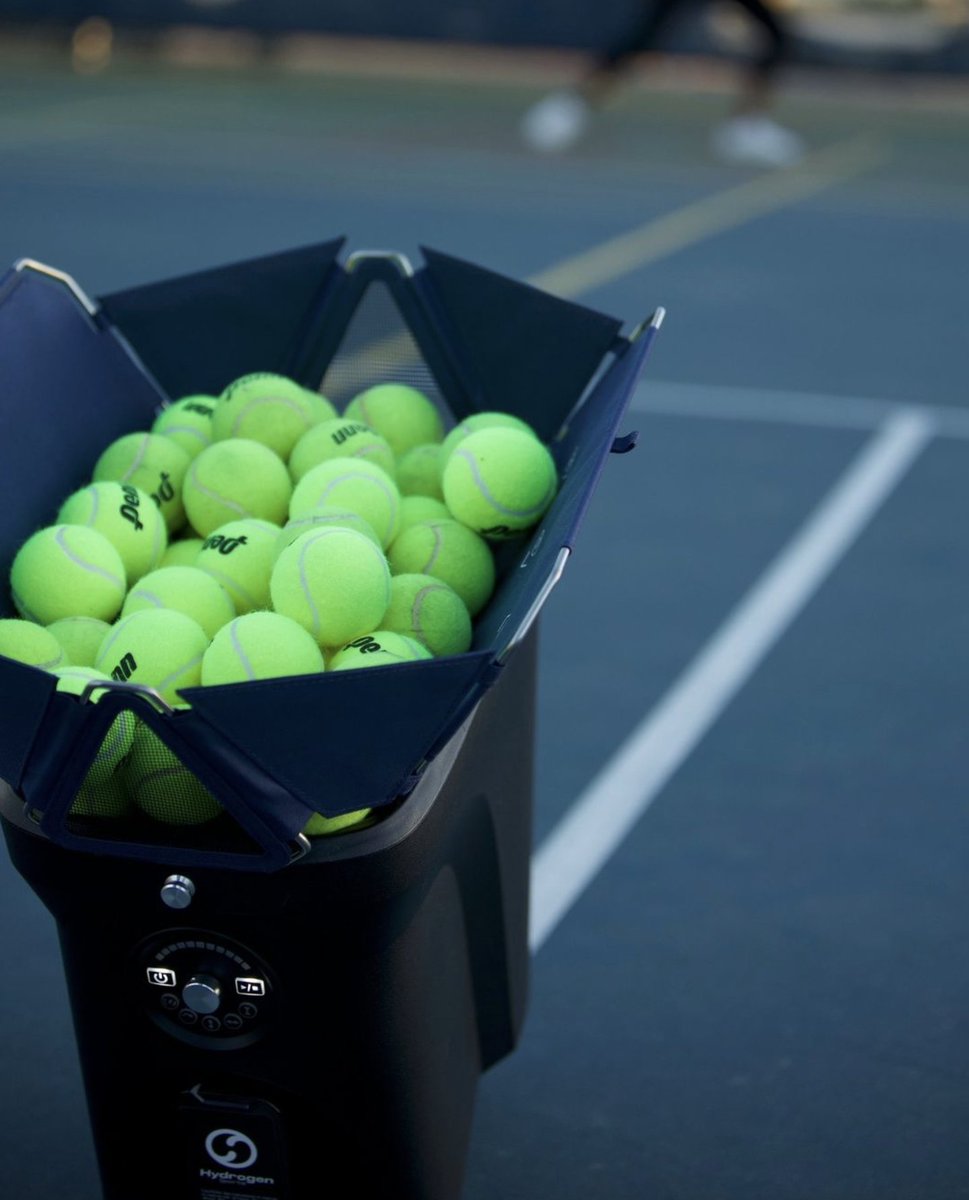 Tennis Equipment Update: One of the smallest, most portable ball machines out there is the Proton from Hydrogen Sports. Impressive compactness and efficiency.