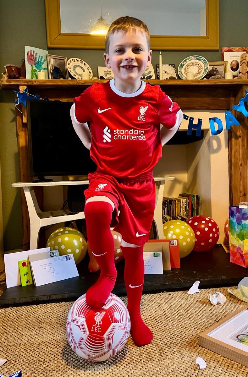 Amongst a plethora of other wonderful presents for his 6th birthday today, our eldest son Fernley loves his first proper @LFC kit. He’s asked me if I can show his favourite players @Darwinn99, @MoSalah and @DiogoJota18 - this is as close as I can get! #YNWA