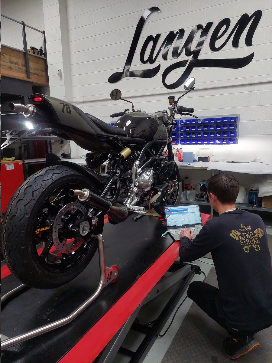 Two Stroke #70 is 'a real humdinger' in the words of the new owner.

Monument bronze bodywork is complemeted by carbon fibre accents and a gloss black cerakote chassis. 
Custom <a href="/dymagwheels/">Dymag Wheels</a> save a total of 6kg of unsprung mass, resulting in enhanced cornering performance.