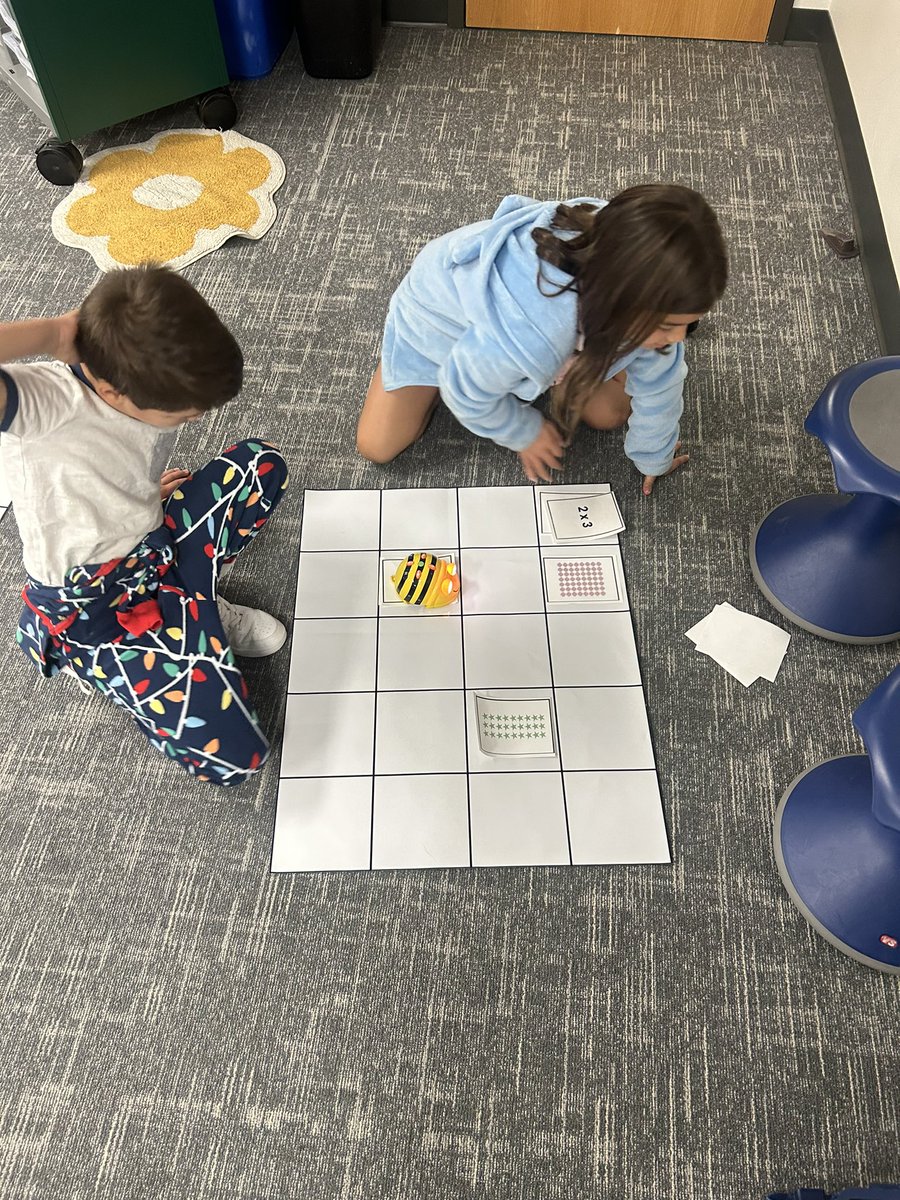 MsWaltersClass3's tweet photo. Collaborative coding fun with Beebots as our second graders match multiplication arrays! 🐝🤖 Strengthening teamwork and math skills in an engaging learning environment. #STEMeducation #RobertsonU #Ubuntu https://t.co/7uNuECFH5Y
