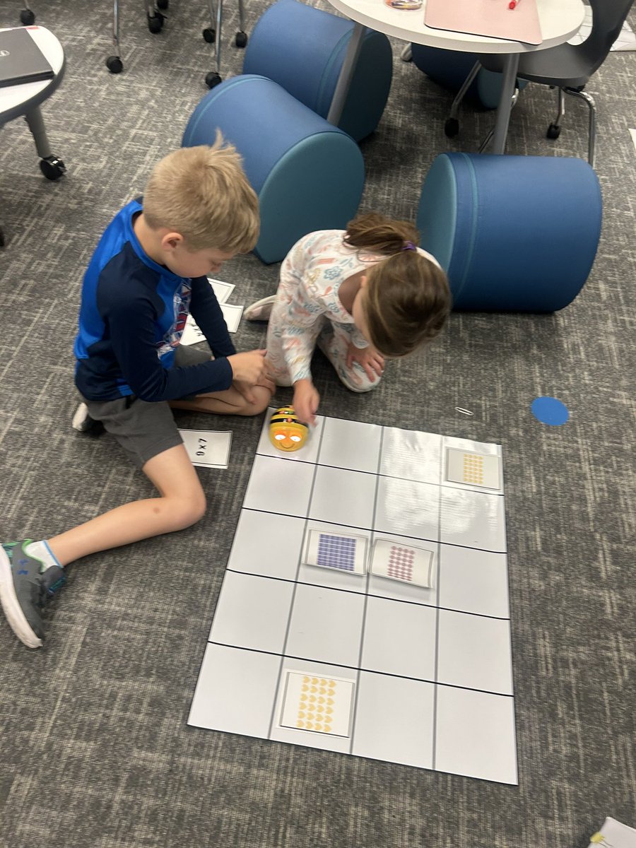 MsWaltersClass3's tweet photo. Collaborative coding fun with Beebots as our second graders match multiplication arrays! 🐝🤖 Strengthening teamwork and math skills in an engaging learning environment. #STEMeducation #RobertsonU #Ubuntu https://t.co/7uNuECFH5Y