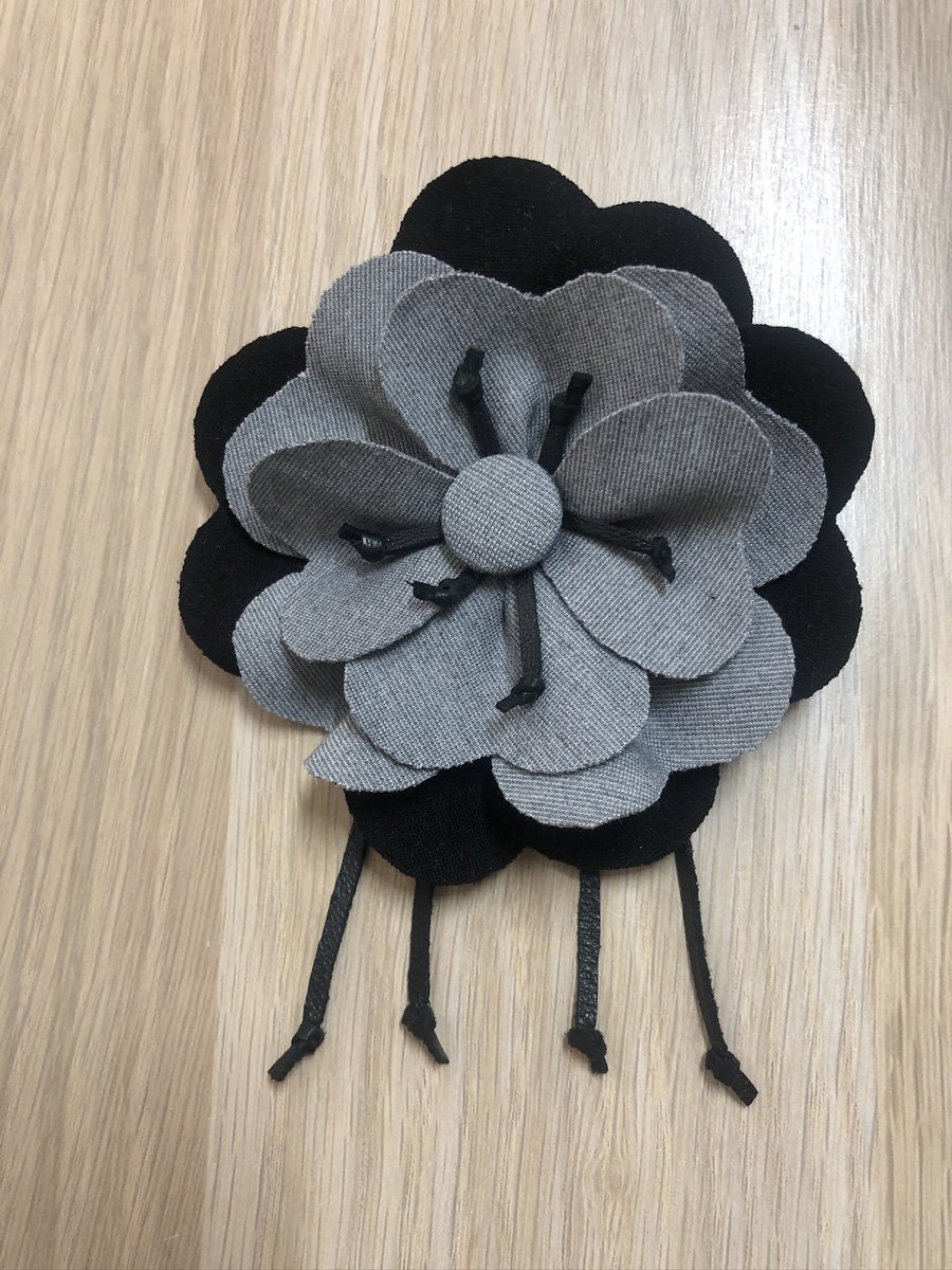 Flower brooch from jersey knit and leather, with your own hands. Video about creating a flower, see on Zen dzen.ru/video/watch/66… #knitwear #brooch #withyourownhands #handicraft #flower #creativity #handicrafts