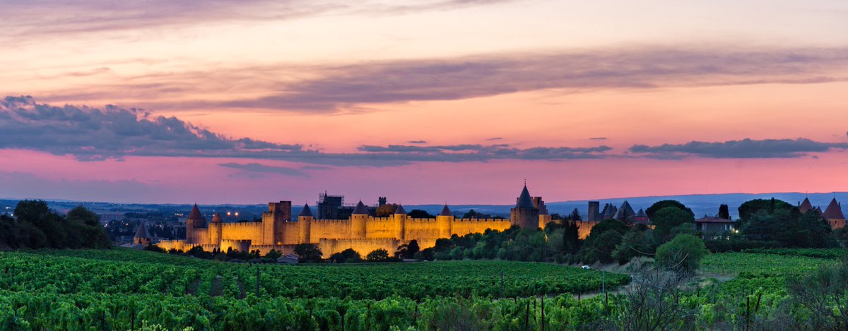 Mesmerizing sunset hues over the historic Carcassonne citadel 🌅✨ 📍City of Carcassonne 📸 : Julen #explorefrance