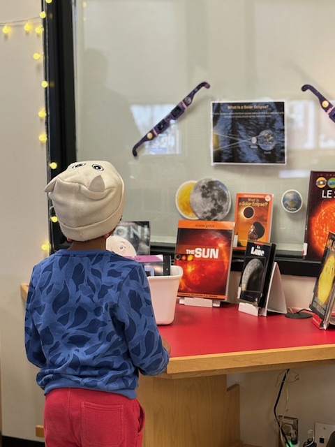 Our Eclipse display was a bit hit - many students borrowing books to read about the Eclipse, the sun, the moon, etc. #manorparklovestoread #solareclipse #elementaryschoollibraries #ocdsblibraries