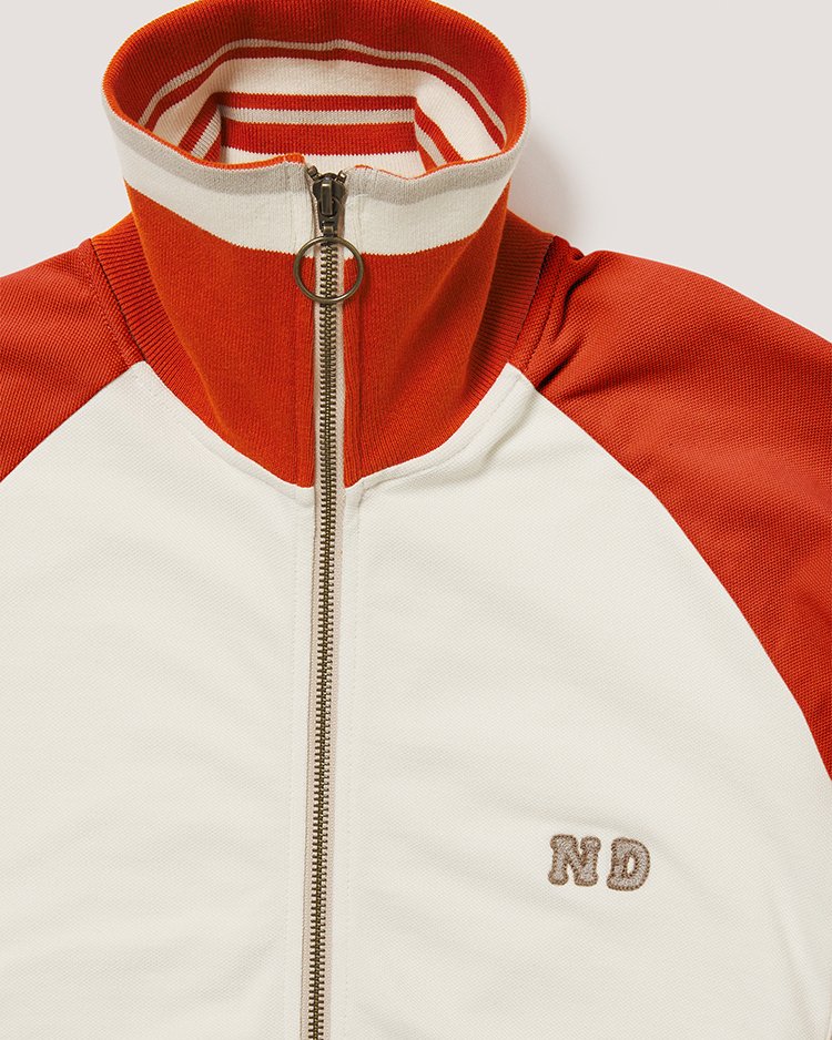 Our iconic Track Top is reworked in this season’s colourway and features a custom striped jersey rib and embroidered chainstitch ND initial detail. Find this new style and more from our SS24 collection at nicholasdaley.net.