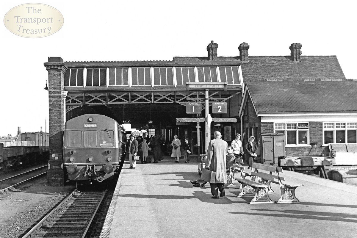 Image found in 'Around the Midland and Great Northern Joint Railway'

shorturl.at/rJT06

'The DMU standing in the main platform on 28 Feb 1959 is, according to the finger-board on the lamp post, destined for ‘West Runton, Sheringham, Weybourne, Holt & Melton Constable’....'