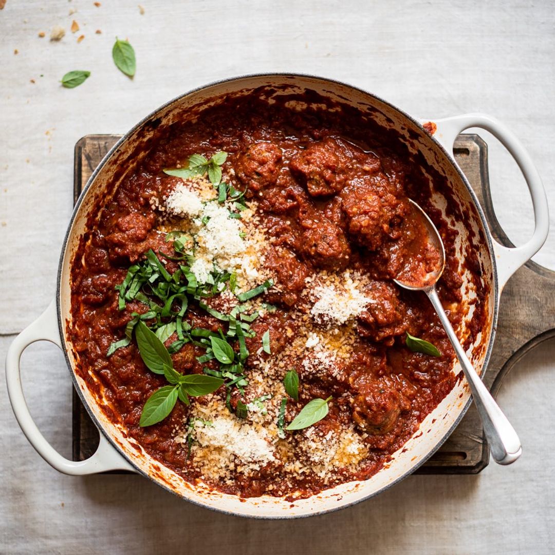 'Completely at home with elbows on the table and roughly torn bread to swab up those delicious pan sauces.' – Di Bibby. How comforting do these Parmesan Meatballs look? 🥰 Visit @bibbyskitchen's link in bio for the recipe.