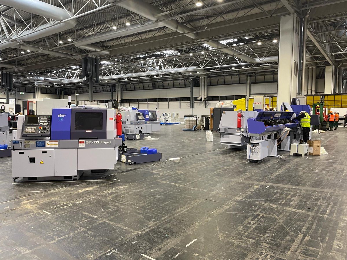 MACH Exhibition 2024 is taking shape! Eight machines with ancillary equipment efficiently delivered to @thenec, lifted into position, and now being set up by our engineering team. @MACHexhibition