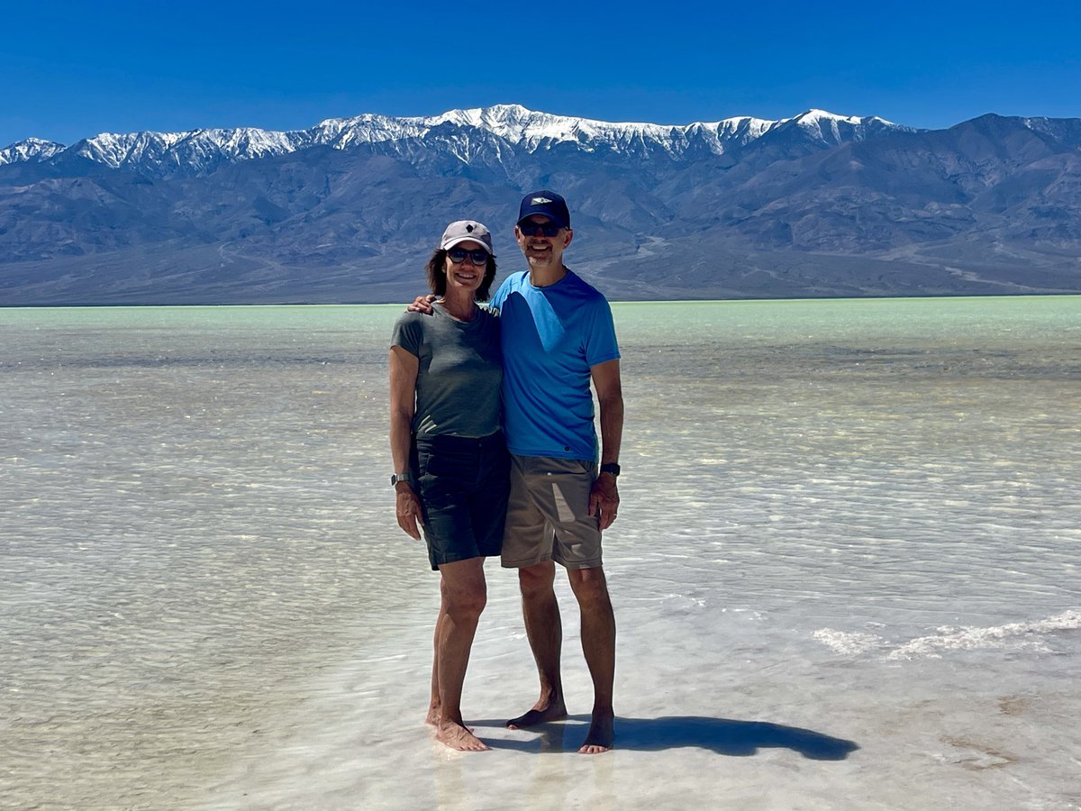 Badwater Basin, 282 feet below sea level filled with unusual amounts of water post atmospheric river rains this winter. Telescope Mt. in the background #DeathValley