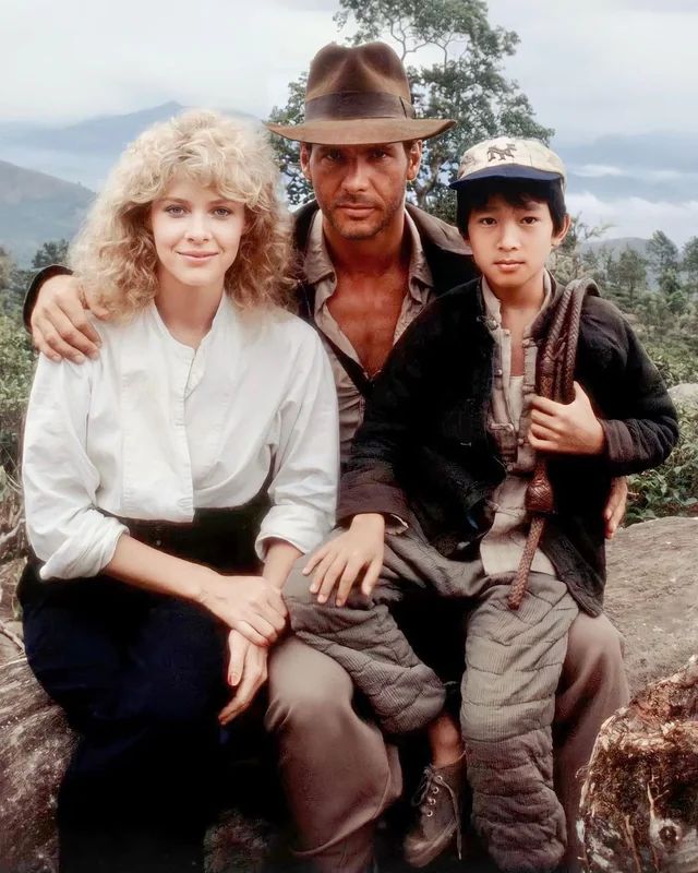 Kate Capshaw, Harrison Ford and Ke Huy Quan during the filming of Indiana Jones and the Temple of Doom in 1984