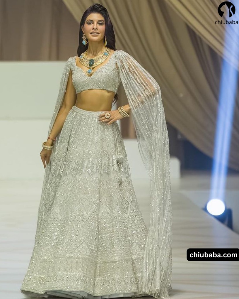 Stunning in white! Bollywood's ethereal beauty Jacqueline Fernandez graces the ramp with elegance in a mesmerizing white lehenga.  @jacquelienefernandez Source: #jacquelienefernandez #StunningInWhite #RampWalk #FashionGoddess #BollywoodBeauty #FashionIcon #LehengaLove #chiubaba