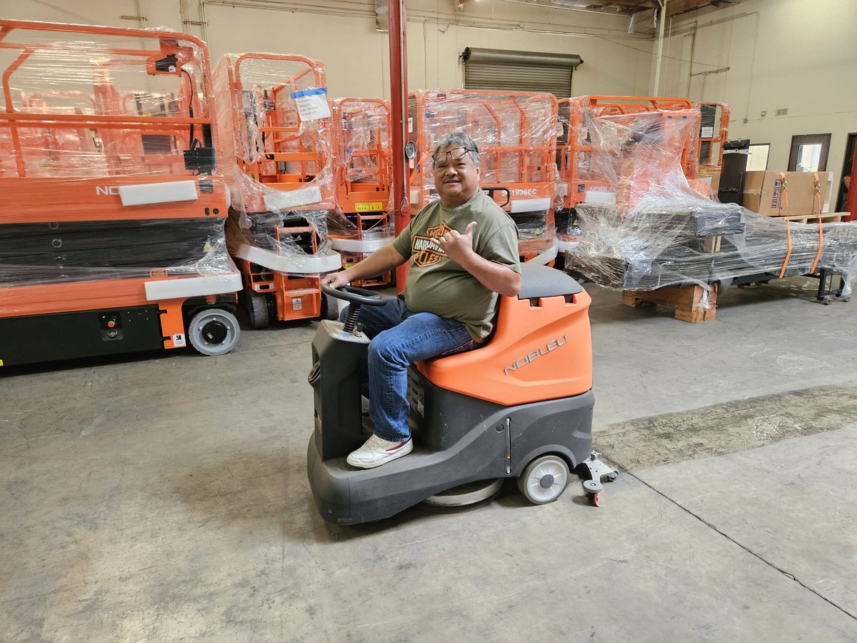 Noblelifts' NR530 ride on scrubber being tested by my Hawaiian brother Nate. Thanks, Nate, for stopping by and allowing me to give you a full sales training and demo of our lift trucks. #noblelift #nobleliftscrubbers