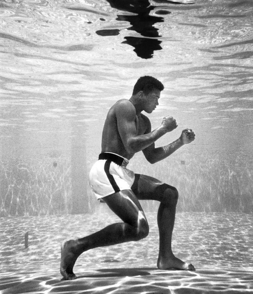 Muhammad Ali posing underwater in 1961 photo shot by Flip Schulke.