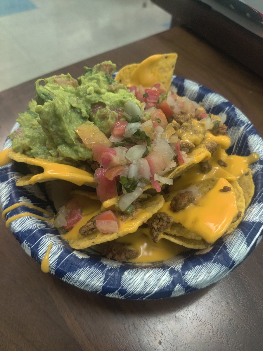 @SuryCandelaria and   Mr. Trent are NACHO average administrators. They know how to treat their team. This freshly made guacamole and nachos was on point. #BestTeamEver 🖤🐆🧡