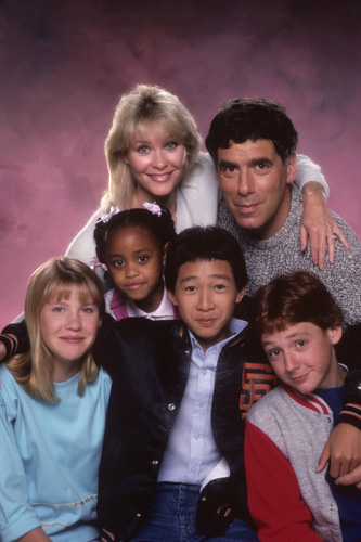 Raise your hands if you watched the sitcom 'Together We Stand' also known as 'Nothing is Easy'! This sitcom starred Elliot Gould and Dee Wallace as a married couple with an array of adopted children! You'll notice Oscar winner Ke Huy Quan is among those kids!