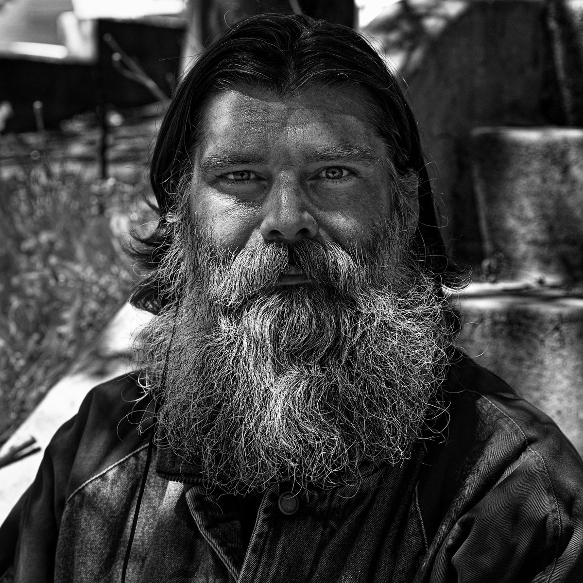 While driving I saw a guy with a look that I knew I wanted to photograph. I had no where to park. He got away. Later as I'm walking in Annapolis he comes walking the other way. “Hey man. I’m a photographer. I like your beard. Can I take your portrait?” “Sure” Thanks Ian.