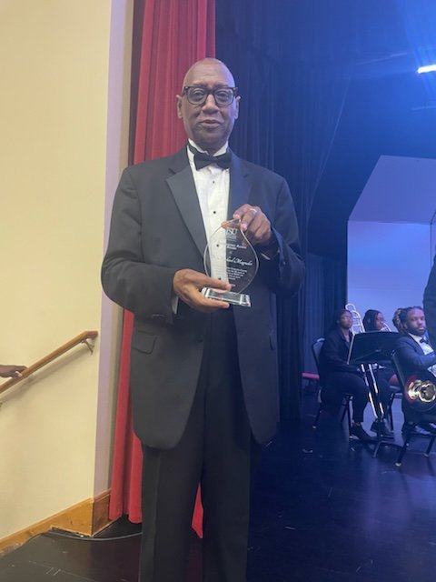 #JSUAlums: Tonight, our chapter president (Jerome Brooks) presented Dr. Michael Magruder (Jackson State alum) with the Distinguished Alumni Award, recognizing his 20 years of leadership as Director of Bands at Winston-Salem State University! #TheeILove