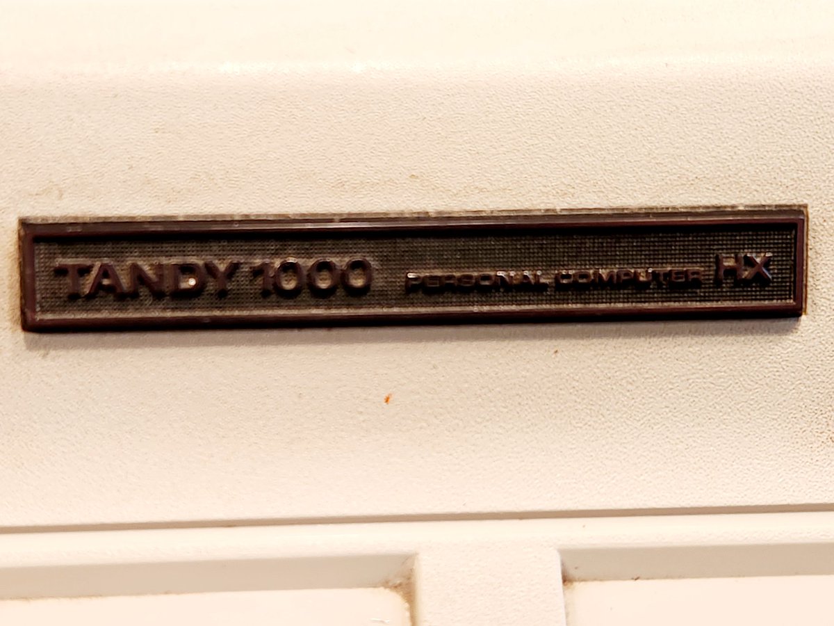 NYVintageMicros's tweet image. I rescued this Tandy 1000 HX  from ewaste, but the cable was clipped, keys knocked off, and cover lost. My friend Ian fixed it. Just need a cover now.

The HX released in 84', with DOS 2.11 stored in a ROM, 640k RAM, 16 color display, and 3 voice sound. 

#Tandy1000
#Radioshack