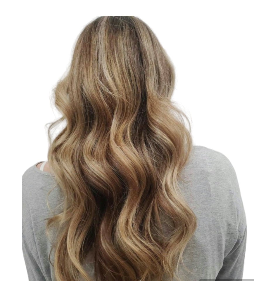 'Transforming strands with the delicate art of ribbon balayage. 🎀✨ Subtle ribbons of light cascading through natural hues, for an effortlessly radiant look. #RibbonBalayage #HairTransformation #NaturalBeauty #BalayageGoals'