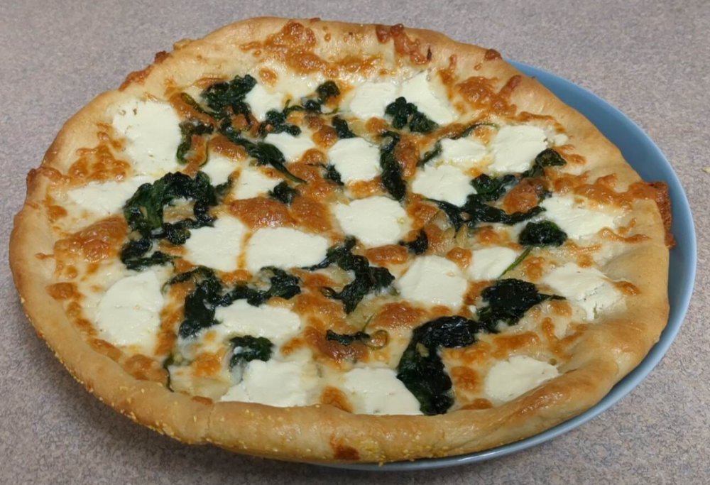 Made a spinach, garlic, ricotta white pie homecookingvsfastfood.com #homecooking #food #recipes #foodie #foodlover #cooking #homecookingvsfastfood