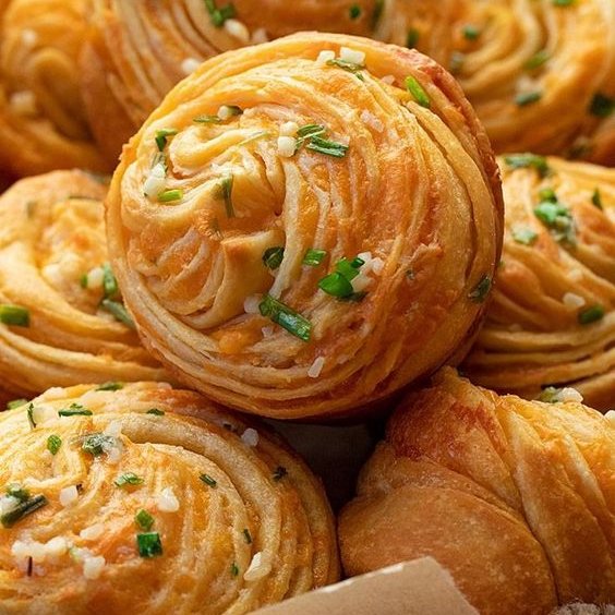 These Cheesy Garlic Cruffins are the perfect addition to any meal!