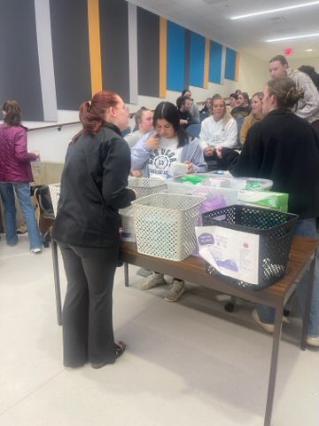 ARIAHEC's tweet photo. What an awesome night at tonight's Kent State University PhiDE meeting! Shoutout to the service chapter for doing an amazing job organizing and packaging more First Aid Kits to be donated to our local elementary schools!

#firstaid #firstaidkit https://t.co/Yec8b2kNqt