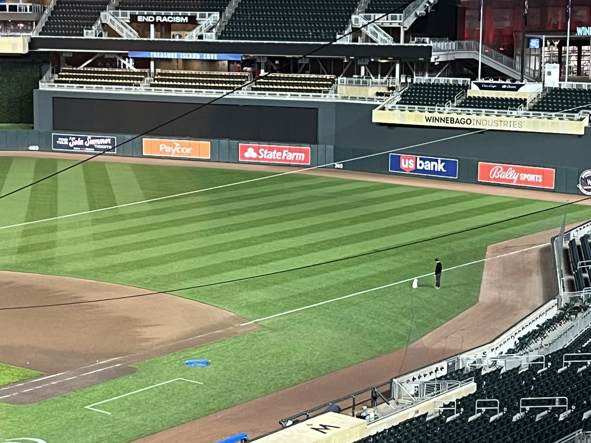Bark in the Park, redux: It’s 10:26 p.m., the game has been over for more than an hour, and Joe Ryan is alone on the field hitting fungoes to his dog.