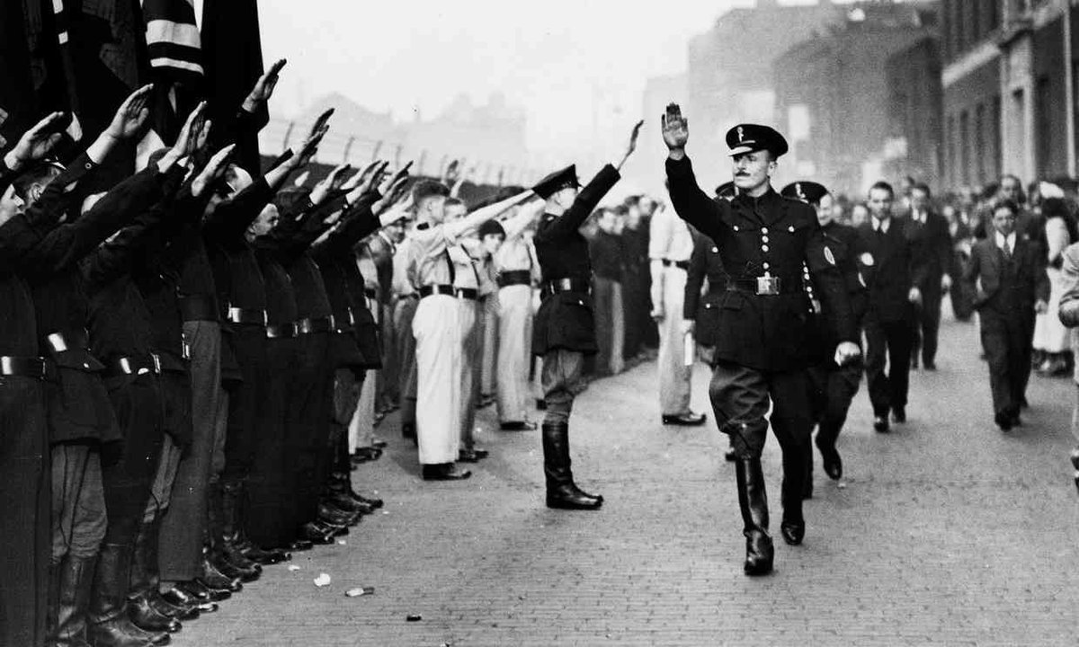 Oswald Mosley and his blackshirts in Royal Mint Street, London, a few days before the battle of Cable Street, September 1936. These days Sunak would put him in the House of Lords. CP/Getty images #RwandaNotInMyName