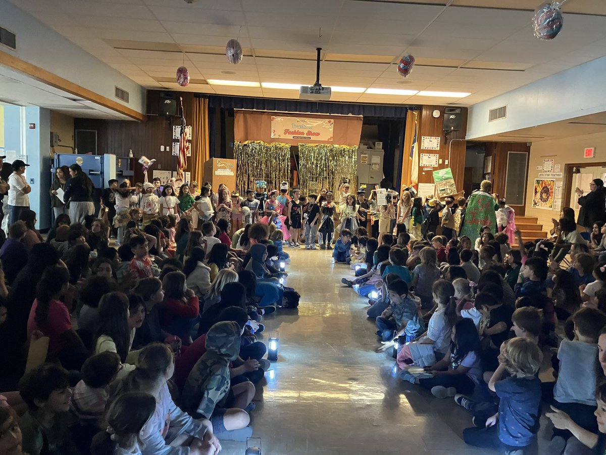 Trashion Fashion show for Earth day today @Joslin_ES! Our 2nd graders all designed clothing with materials that were going to be thrown away. True PBL! Science+Writing+Art and Design+Evaluating Work into a culminating show! Way to go 2nd grade team! @Elementary_AISD @CLI_AISD