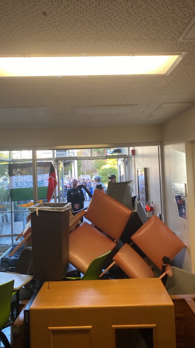 Barricades at the Cal Poly Humboldt occupation, where riot police have recently arrived on the scene