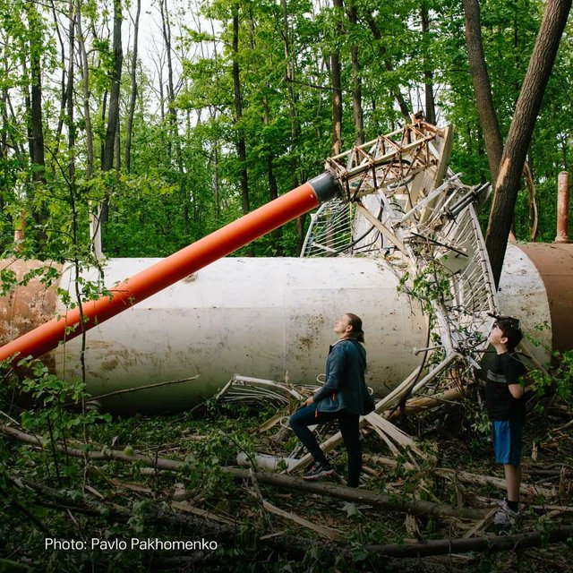 Photographer Pavlo Pakhomenko shares a chilling photo of a fragment of the Kharkiv TV Tower, destroyed by Russia, lying on the ground #SupportUkraine #Ukraine #RussiaUkraineConflict #warfootage #warinukraine #Russiaisaterroriststate #ukrainianwarvideos #RussianWarCrimes