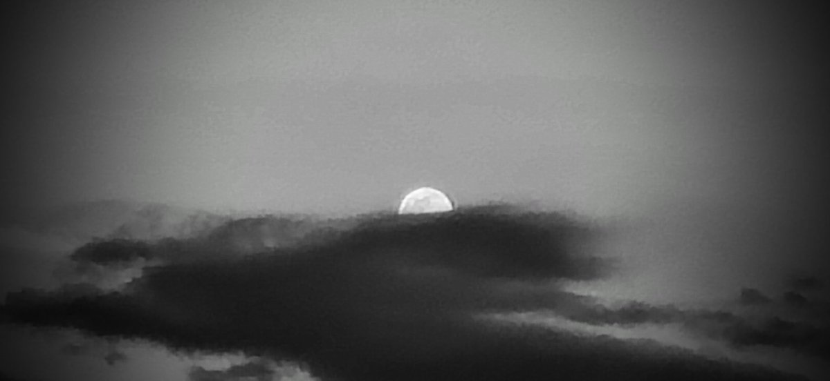 Sweet silent moon.
You find a sense of
comfort behind
the clouds,
as they move with
the gentle
push of
Spring's wind.
You play a celestial game
of hide
& seek,
always peeking,
with a sly smile
on your
face.
Your light always
gives you
away.
The clouds tease
you.
Go ahead & play.