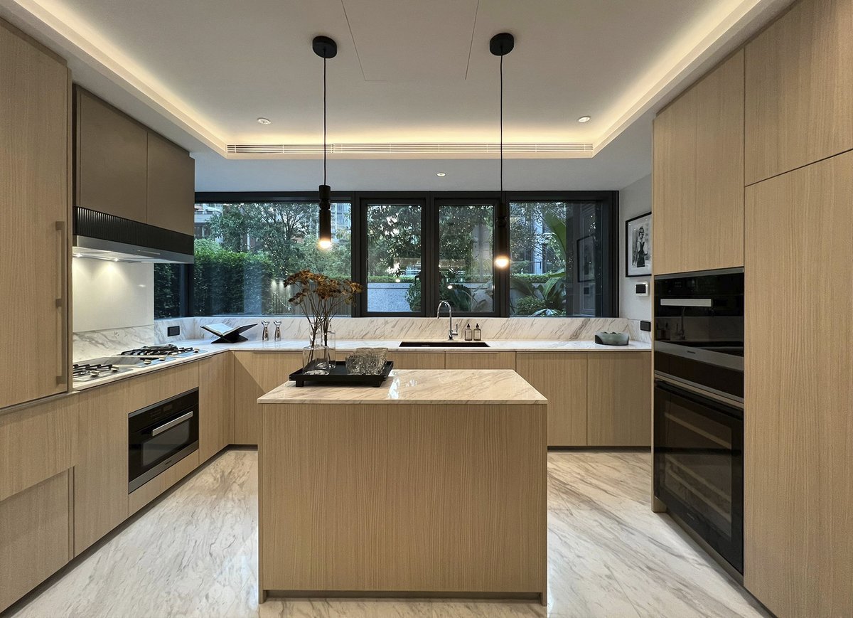 Using blonde warm wood mixed with grey marbles and black tones in the joinery here, creates modern striking lines with the 'less is more' KHI tune, for this apartment in China. #kellyhoppendesign #beforeandafer #interiordesign