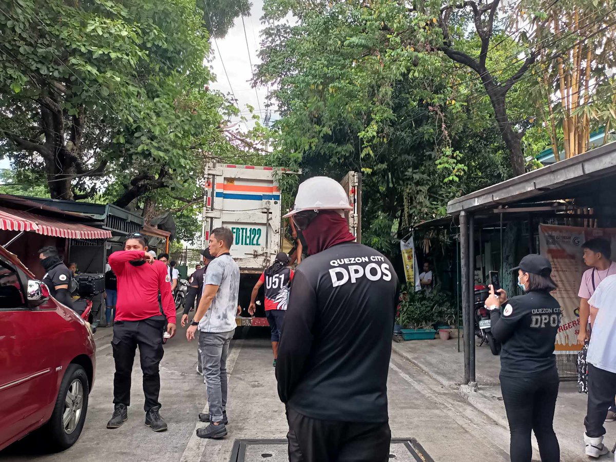 LOOK: Enforcers from the Quezon City Department of Public Order and Safety (DPOS) conducted a 'clearing operation' at Area 2 earlier today at around noon. Some stalls, plants and signage along the sidewalks were confiscated from the local vendors. This is a developing story.